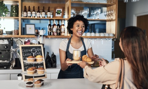 Woman serving coffee