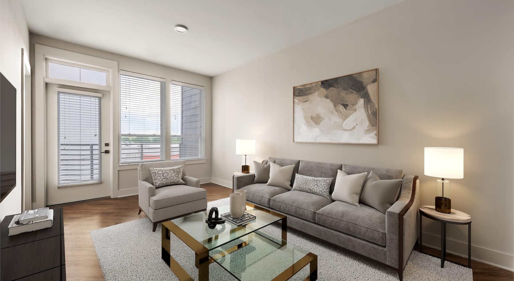 living room with large window and couch