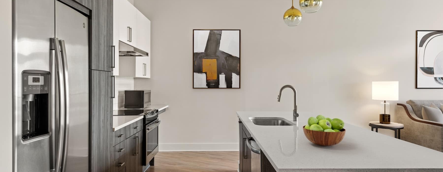 bright kitchen with wooden floors and decor