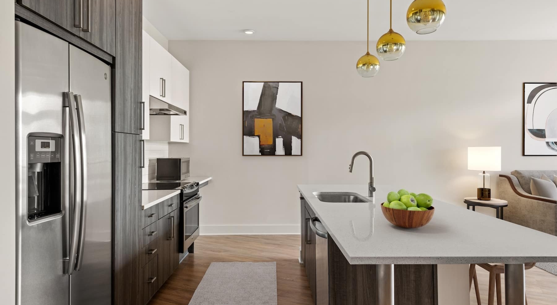 kitchen with an island and wooden floors