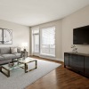 A spacious living room in our Emerson at Montford Park Apartments in Charlotte, NC.