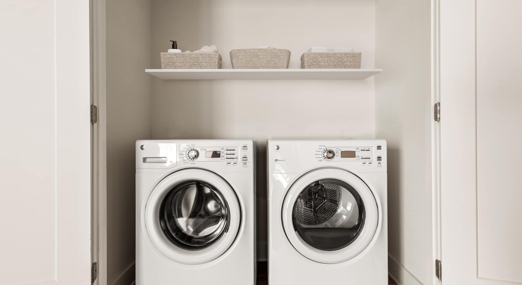 washer and dryer in a closet