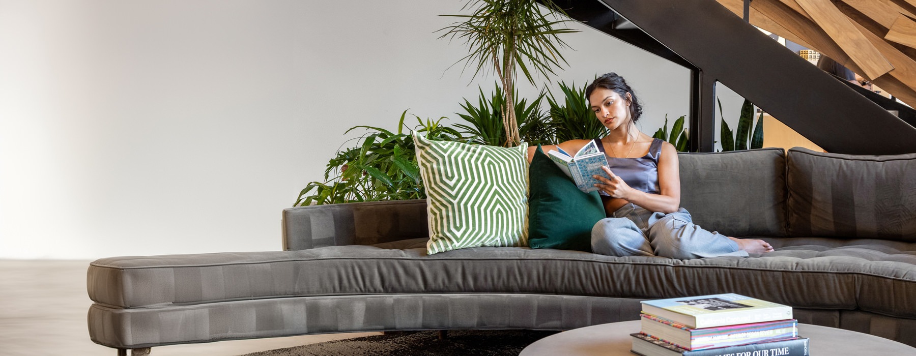 a woman reading at home